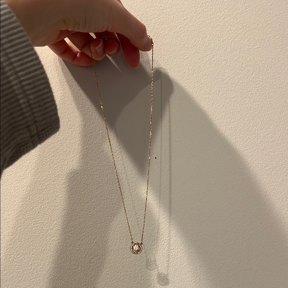 Swarovski Gold Necklace with Dancing Pendant